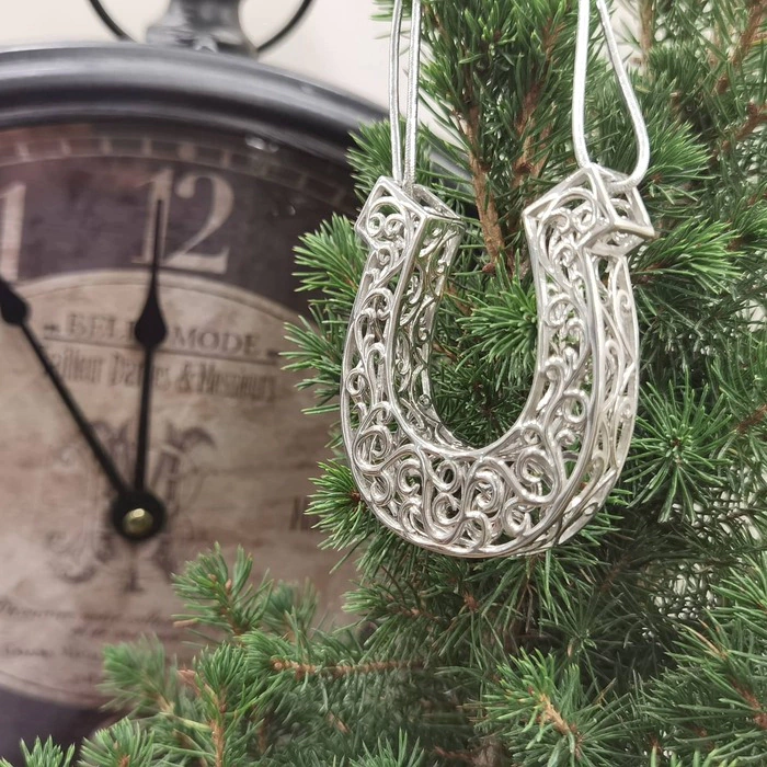 Christmas tree toy "Horseshoe" made of silver